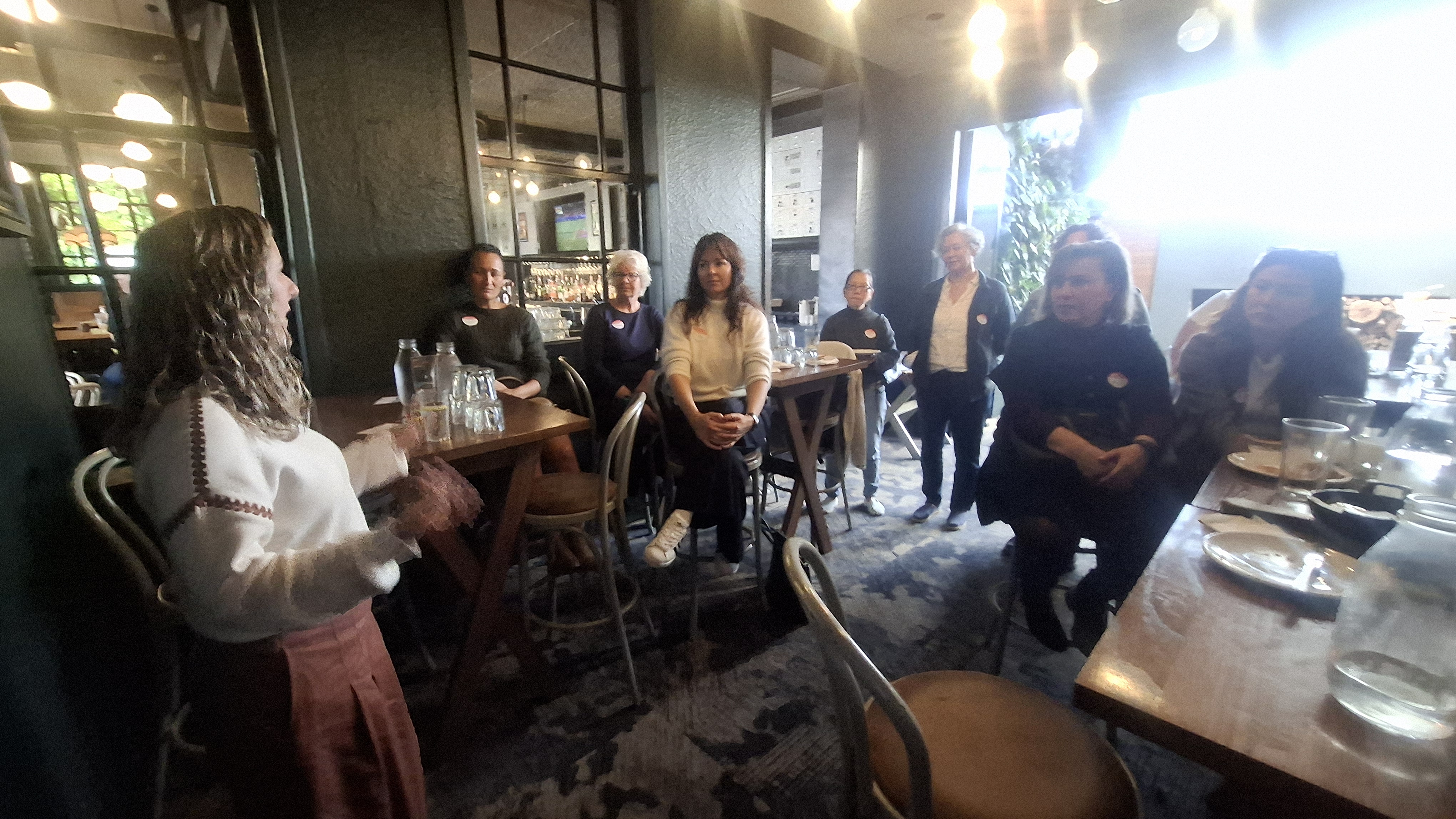 Guest speaker addressing the seated group at The Union Post, Ellerslie